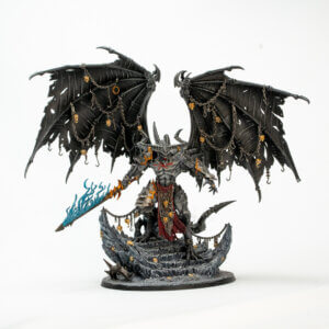 Dark, winged demon figure in spiked armor standing on a rocky base, adorned with chains and skulls, wielding a blue flame sword.